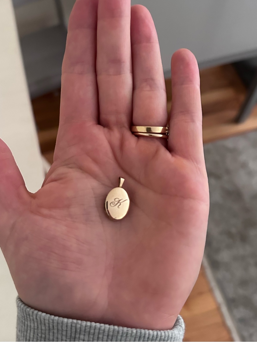 Gold Oval Locket with K Engraving